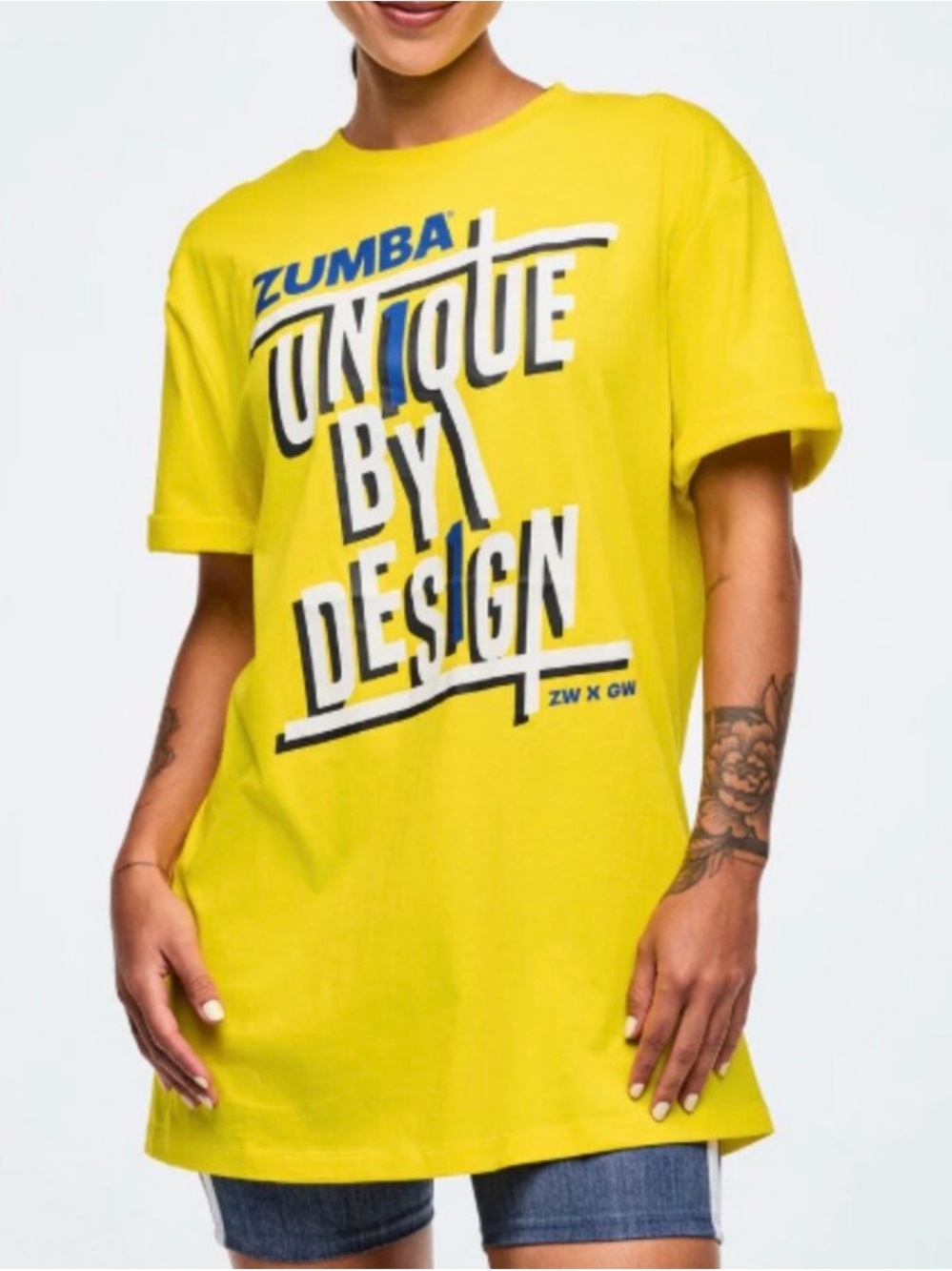 Zumba Wear ZW X GW Yellow "Unique By Design" Graphic Tee Unisex OS “Gina Drop”